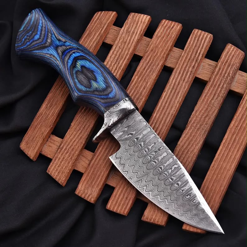 Custom handmade folding pocket knife with blue resin handle and leather sheath