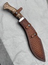 Heavy-duty tactical Kukri featuring a recurved high-carbon steel blade